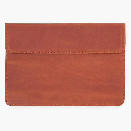 Cognac Crazy Horse leather MacBook sleeve with magnetic flap, front view