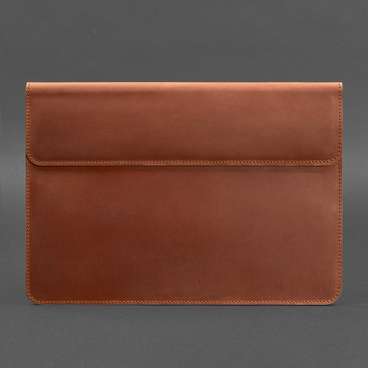 Cognac Crazy Horse leather MacBook sleeve with magnetic flap closure, front view