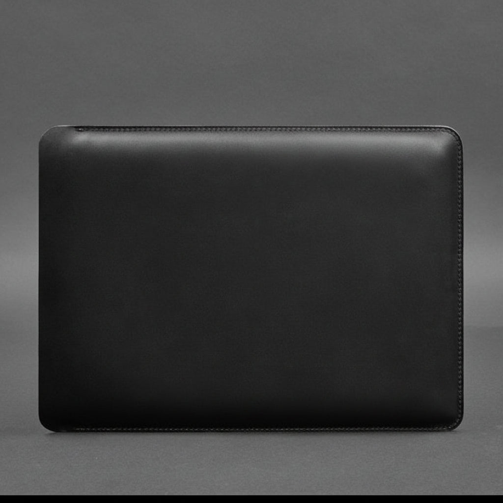 Black Crazy Horse leather MacBook sleeve on a gray background